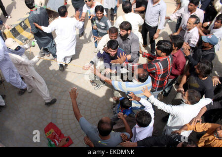 MQM and PTI activists clashing with each other near Nine Zero during ...