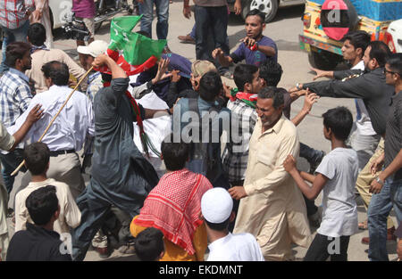 MQM and PTI activists clashing with each other near Nine Zero during ...