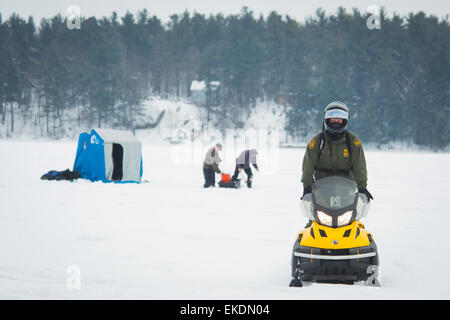 CBP Office of Border Patrol conducts cold weather operations in the Wellesley Island, Alexandria Bay and Clayton region of New York along the border of the United States and Canada. Border Patrol Agents patrol frozen water ways along the border with the U.S. and Canada.  James Tourtellotte Stock Photo