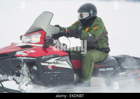 CBP Office of Border Patrol conducts cold weather operations in the Wellesley Island, Alexandria Bay and Clayton region of New York along the border of the United States and Canada. Border Patrol Agents patrol frozen water ways along the border with the U.S. and Canada.  James Tourtellotte Stock Photo