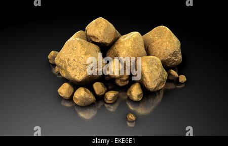 A collection of gold nuggets on an isolated dark background Stock Photo