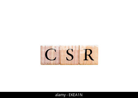 Wooden letters CSR on white background, top view. Corporate social ...
