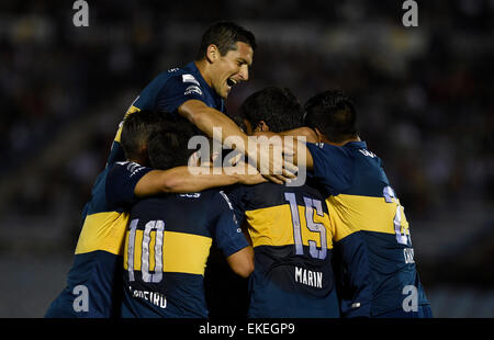 Montevideo, Uruguay. 9th Apr, 2015. Argentine Boca Juniors' players celebrate a score during the match of the Libertadores Cup 2015 against Wanderers of Uruguay, held at Centenario stadium in Montevideo, capital of Uruguay, on April 9, 2015. © Nicolas Celaya/Xinhua/Alamy Live News Stock Photo