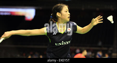 Singapore. 9th Apr, 2015. Nozomi Okuhara of Japan serves during the women's singles second round match of OUE Singapore Open against Sung Ji Hyun of South Korea in Singapore, April 9, 2015. Nozomi Okuhara won 2-0. © Then Chih Wey/Xinhua/Alamy Live News Stock Photo