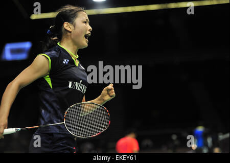 Singapore. 9th Apr, 2015. Nozomi Okuhara of Japan reacts during the women's singles second round match of OUE Singapore Open against Sung Ji Hyun of South Korea in Singapore, April 9, 2015. Nozomi Okuhara won 2-0. © Then Chih Wey/Xinhua/Alamy Live News Stock Photo