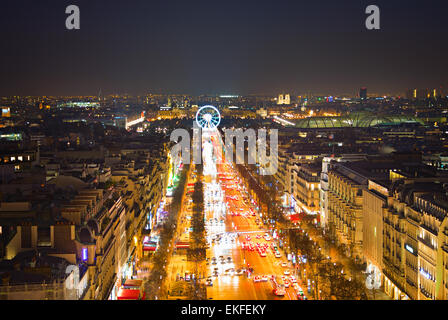 Avenue Champs-Elysees and ferris wheel  in Paris, France. View from Triumphal Arch Stock Photo