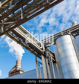 Chemical plant for the treatment of chipboard for furniture factory, with chimney Stock Photo