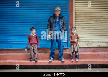 Portrait of a grand father and his two grand children in Kathmandu, Nepal Stock Photo