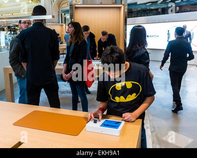 Paris, France. Crowd Customers, French Teen, Apple Corp. Store in French Department Store, Galeries Lafayette for I-Watch products, apple showroom, apple customer, teenagers accessories Stock Photo