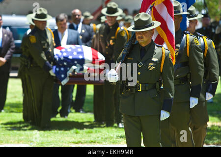 CBP Border Patrol agents solemnly carry the body of a fallen officer as ...