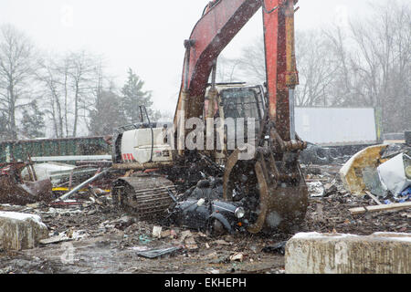 Customs and Border Protection in conjunction with British Authorities destroys a Mini Cooper that had many violations related to importation.  James Tourtellotte Stock Photo