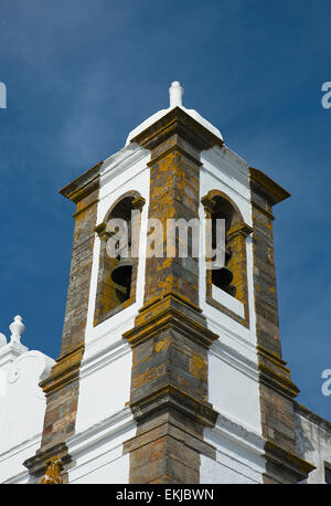 Belfry of Monsaraz across from the square from the Parochial church of Nossa Senhora da Lagoa Stock Photo