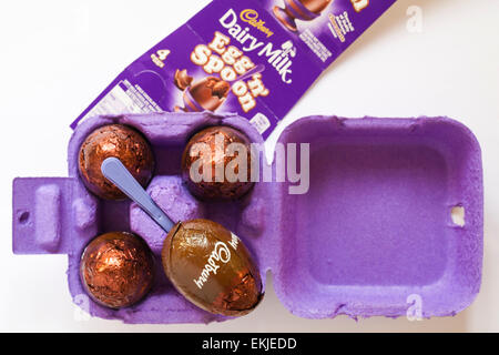 Carton of Cadbury Dairy Milk Egg 'n' Spoon - choc-full of fluffy delicious chocolate mousse open to show contents - ready for Easter Stock Photo