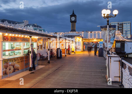 Evening on Brighton Pier, East Sussex, England. Stock Photo