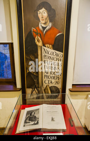 Torun, Poland. 2nd Jan, 2015. Portrait of Nicolaus Copernicus over a a copy of his famous book ''De revolutionibus orbium coelestium'' in the museum with his name in Torun, Poland. © Celestino Arce/ZUMA Wire/ZUMAPRESS.com/Alamy Live News Stock Photo