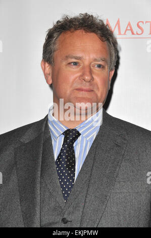 LOS ANGELES, CA - JULY 22, 2012: Hugh Bonneville at photocall for the third series of Downton Abbey at the Beverly Hilton Hotel. Stock Photo