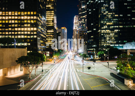 Traffic and buildings on Figueroa Street at night, in the Financial District, Los Angeles, California. Stock Photo