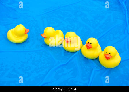 Yellow Rubber Ducks in Pool Amusement Park Fishing Game Stock Photo - Alamy