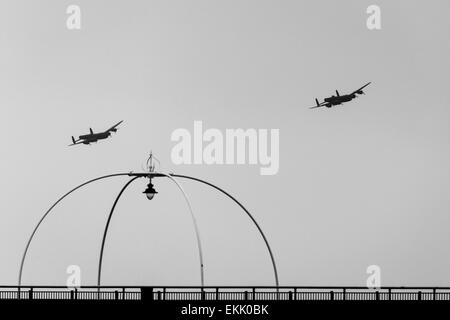 Pair of Lancasters in the skies above Southport pier. Stock Photo