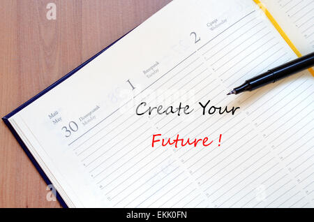 Create Your Future Concept In Yellow Blank Notepad On Office Wooden Table Stock Photo