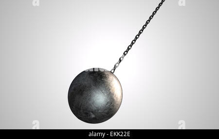 A regular metal wrecking ball attached to a chain on an isolated white background Stock Photo