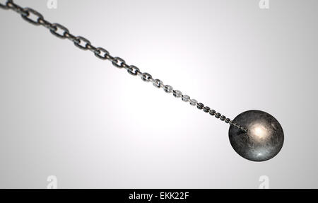 A regular metal wrecking ball attached to a chain on an isolated white background Stock Photo