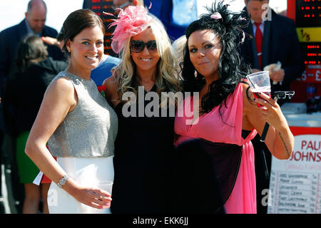 Aintree Racecourse, Liverpool, UK. 11th Apr, 2015. Crabbies Grand National Race Day. Racegoers dress up for the days action Credit:  Action Plus Sports Images/Alamy Live News Stock Photo