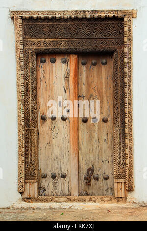 Antique, hand crafted wooden door, Stone Town, Zanzibar Stock Photo