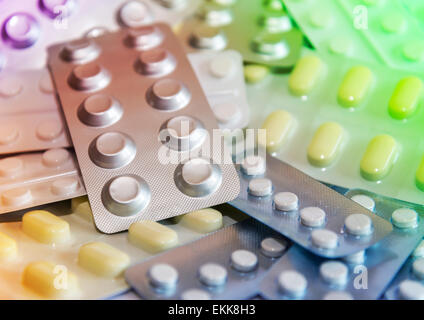 A pile of different medications in blister packs with selective focus Stock Photo