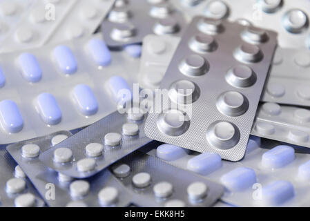 A pile of different medications in blister packs with selective focus Stock Photo