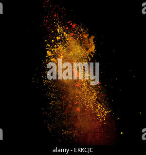 Launched colorful powder, isolated on black background Stock Photo
