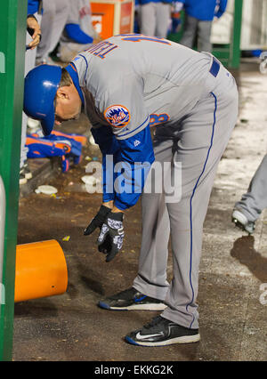 New York Mets third base coach Tim Teufel (18) warms his hands on a cold night during the game against the Washington Nationals at Nationals Park in Washington, DC on Wednesday, April 8, 2015. The Nationals won the game 2-1. Credit: Ron Sachs/CNP (RESTRICTION: NO New York or New Jersey Newspapers or newspapers within a 75 mile radius of New York City) - NO WIRE SERVICE - Stock Photo