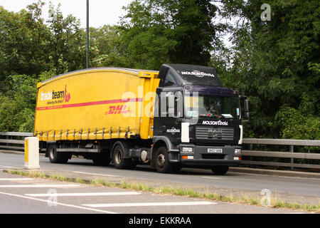 A truck and other traffic traveling along the A23 road in Coulsdon, Surrey, England. Stock Photo