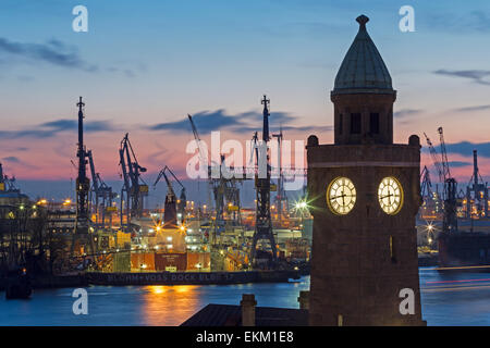 Glasenturm tower of the St. Pauli pier with a tanker in the dry dock of Blohm & Voss shipyards at back, Hamburg, Germany, Europe Stock Photo