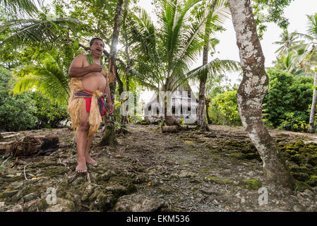 Man, telling the history of the village, in traditional costume. at the village of Yap island. Stock Photo
