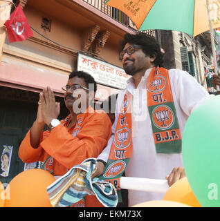 Indian political party BJP candidate Babul Supriyo along the Tushar Kanti Ghosh during the KMC Election campaign at Kalighat in Kolkata on Saturday. Stock Photo