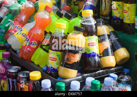 Fizzy carbonated soft drinks for sale in a shop. Sugary fizzy drinks ...