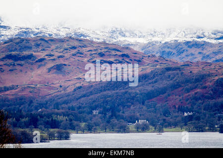 Lake Windermere, Cumbria. 12th April, 2015. UK Weather: Very cold and Windy Day Snow on the Langdale Pikes overlooking Lake Windermere Credit:  Gordon Shoosmith/Alamy Live News Stock Photo