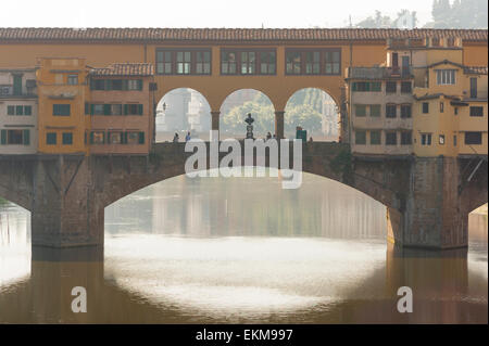 Florence Italy bridge, scenic view of the Ponte Vecchio in Florence back-lit by early morning sun, Tuscany, Italy. Stock Photo
