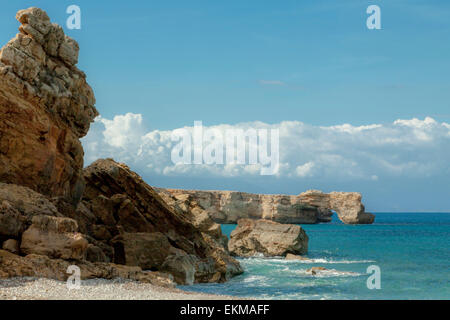 Imposing sandstone cliffs at Geropotamos beach with a panoramic view on the Mediterranean Sea, Rethymno region, Crete, Greece. Stock Photo