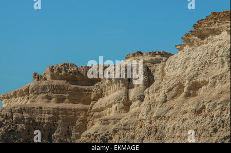 Impressive formations of sandstone rock cliffs at Matala, situated on the Bay of Messara, Crete, Greece. Stock Photo