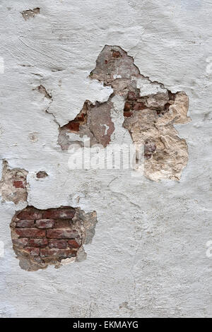 Holes in plastered brick wall. Can be used as background, Copy spac Stock Photo