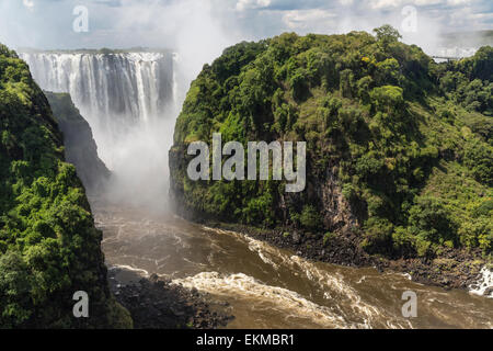 Victoria Falls and Zambezi River gorge in Zambia seen from Victoria Falls Bridge between Zimbabwe and Zambia Stock Photo