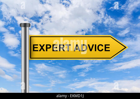 expert advice words on yellow road sign on blue sky Stock Photo