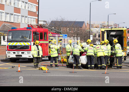 Chris Bull . WED 8-4-15. ALTRINCHAM  , Fire and ambulance crews attend a crash between a Ford Ka and a Range Rover Stock Photo