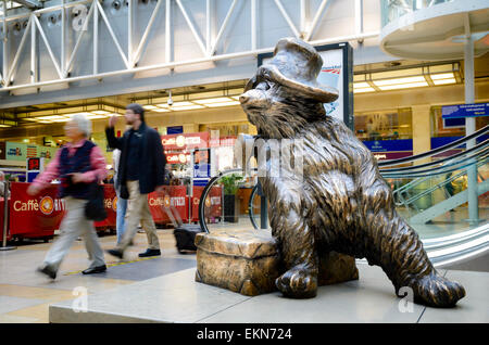 The Paddington Bear statue at Paddington Station, London, England.. Station concourse, forecourt; bronze sculpture; fictional character, public art; Stock Photo