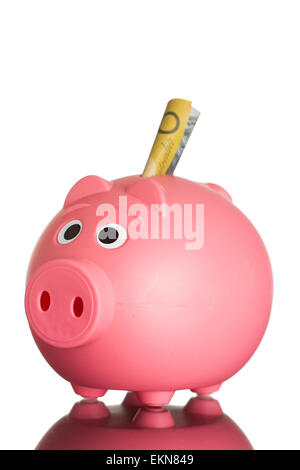 Pink piggy bank with australian dollars Stock Photo