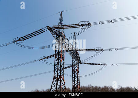 High voltage pylons, Power lines Stock Photo