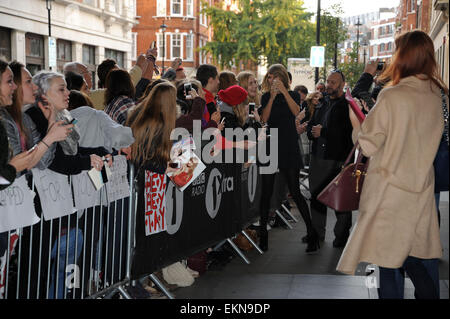 Taylor Swift is greeted by fans outside the BBC Radio 1 studios  Featuring: Taylor Swift Where: London, United Kingdom When: 09 Oct 2014 Stock Photo