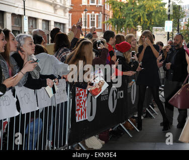 Taylor Swift is greeted by fans outside the BBC Radio 1 studios  Featuring: Taylor Swift Where: London, United Kingdom When: 09 Oct 2014 Stock Photo